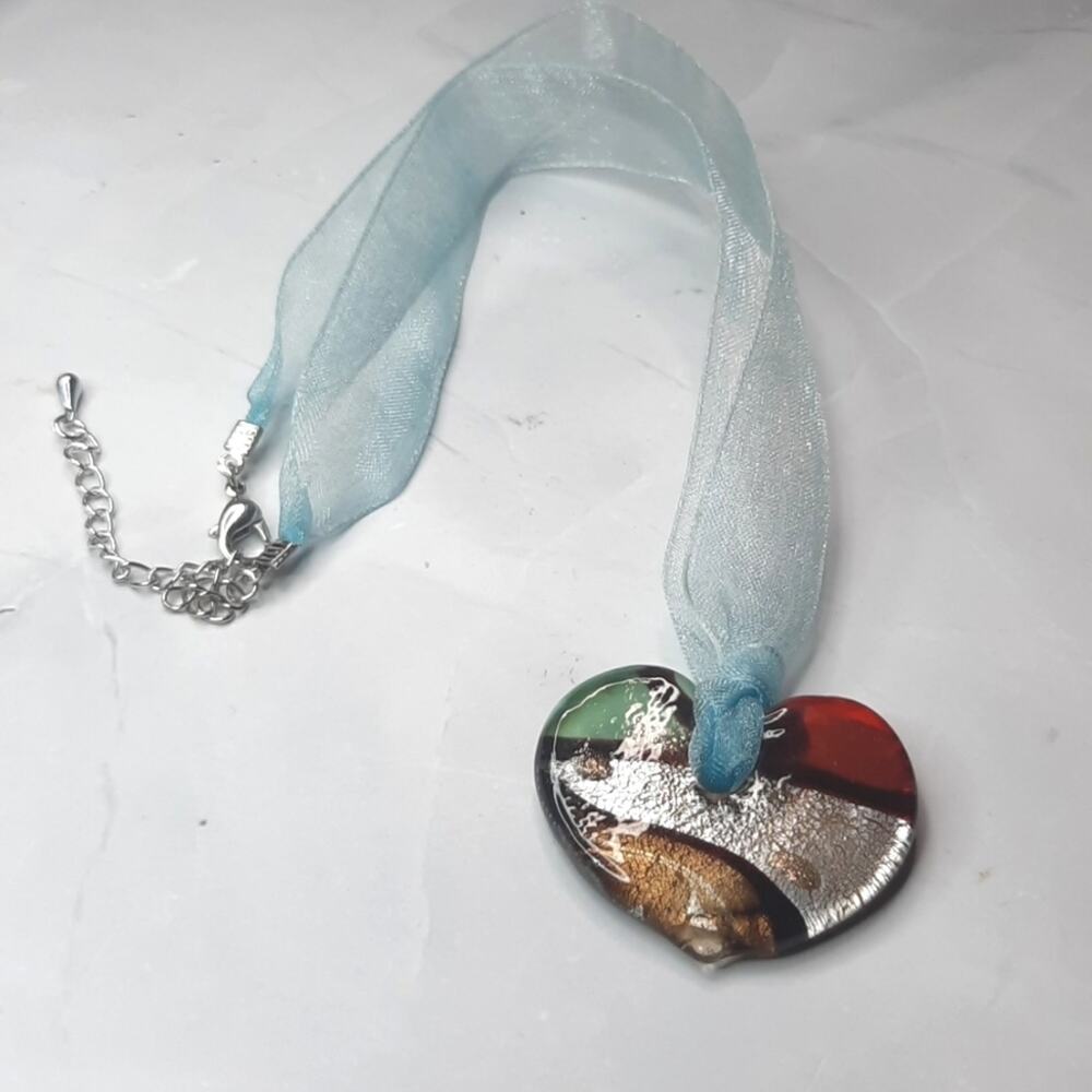Heart Pendant On Shimmery Blue Ribbon